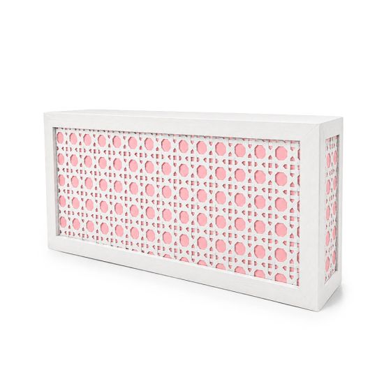 Elegant white woven cane bar with dusty rose backing and geometric lattice design