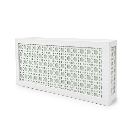 White woven cane bar facade with sage green backing and geometric lattice design