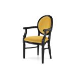 Chandelle armchair with a matte black frame and champagne beige velvet upholstery.