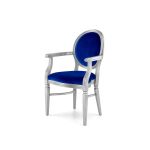 Stunning royal blue velvet Chandelle armchair supported by a carved silver frame.