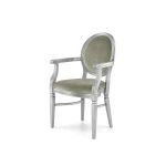 Luxury Chandelle armchair with a polished silver frame and bright silver velvet cushions.