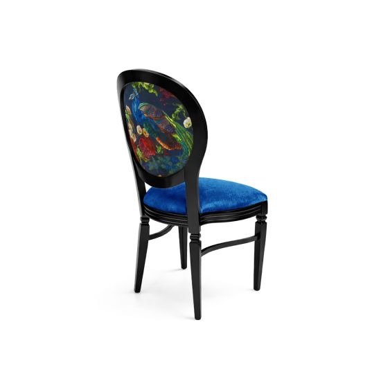 Black dining chair with blue velvet seat and oval backrest featuring colorful peacock design for luxury event seating