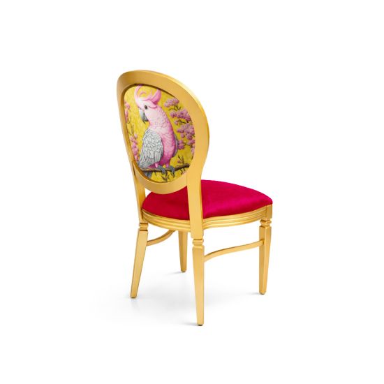 Gold Chandelle chair featuring an oval floral back in yellow and pink tones with a vibrant pink upholstered seat, elegant vintage-style banquet chair for weddings and formal events