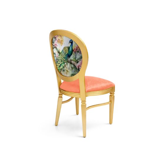 Gold dining chair with coral velvet seat and oval backrest featuring peacock and floral garden artwork