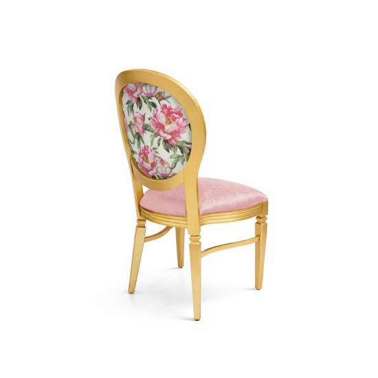 Gold dining chair with pink velvet seat and oval backrest featuring pink peony floral design for elegant wedding and event seating