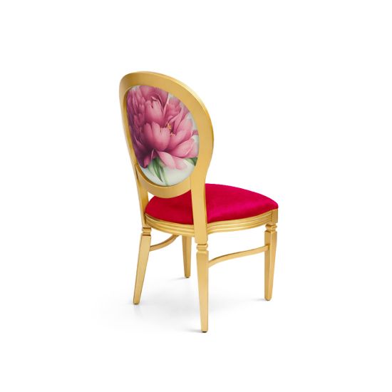 Gold dining chair with red upholstered seat and oval backrest featuring pink peony floral design for luxury event and wedding seating