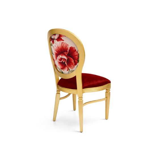 Gold dining chair with red velvet seat and oval backrest featuring scarlet floral design for luxury weddings and elegant event seating