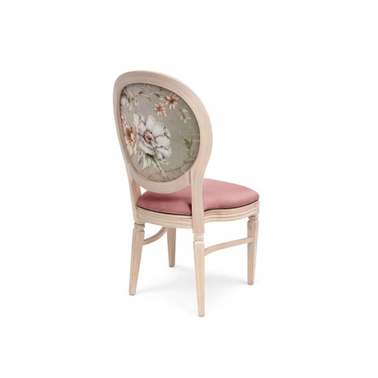 Natural Chandelle chair featuring an oval patterned back in beige and green tones with a blush upholstered seat, elegant vintage-style banquet chair for weddings and formal events
