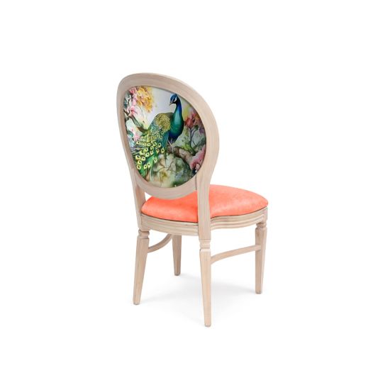 Natural Chandelle chair with oval floral back and coral upholstered seat, elegant vintage-style banquet chair for weddings and formal events