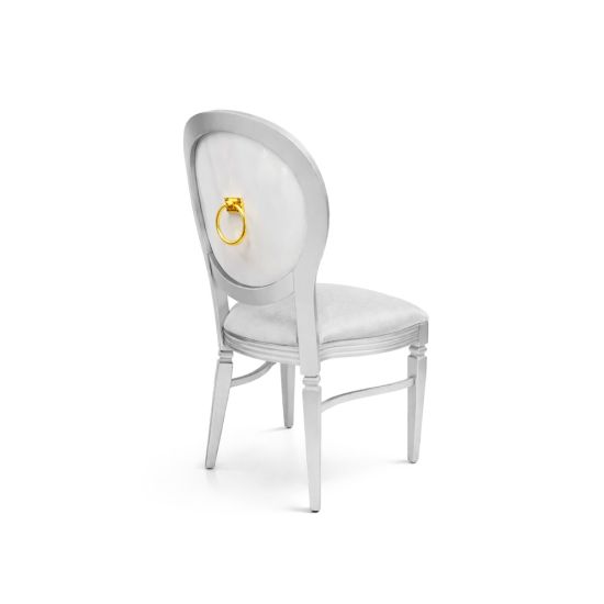 White Chandelle chair with oval clear back and gold ring accent, sleek vintage-style banquet chair for weddings and formal events