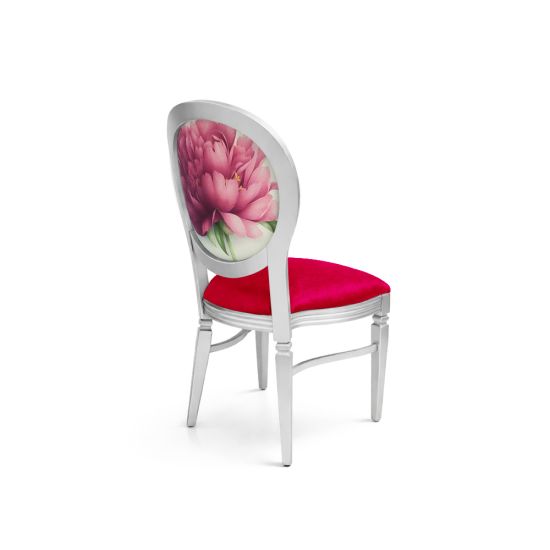 Silver dining chair with red velvet seat and oval backrest featuring pink peony floral design for elegant wedding and event seating