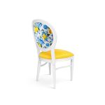 White Chandelle chair with oval floral back in blue and yellow tones and yellow upholstered seat, elegant vintage-style banquet chair for weddings and formal events