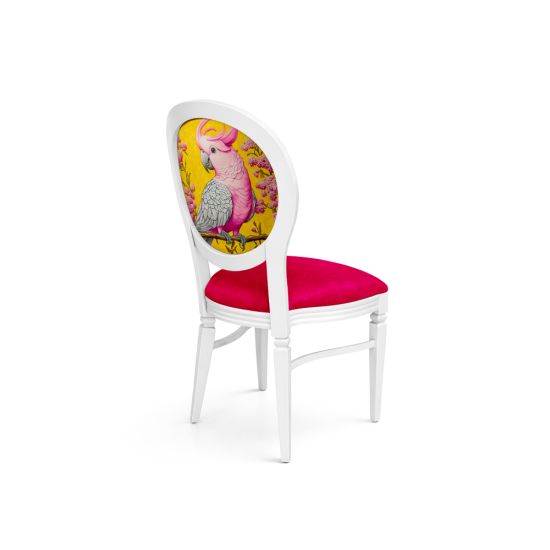 White Chandelle chair featuring an oval floral back in yellow and pink tones with a vibrant pink upholstered seat, elegant vintage-style banquet chair for weddings and formal events