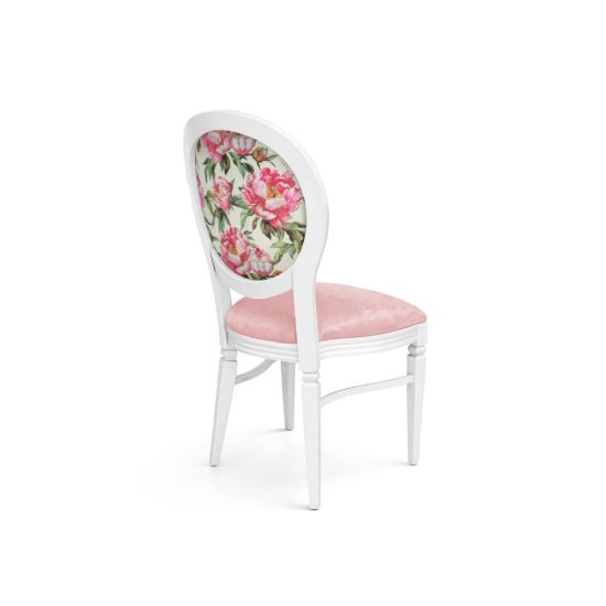 White Chandelle chair featuring an oval floral back in pink and green tones with a soft pink upholstered seat, elegant vintage-style banquet chair for weddings and formal events