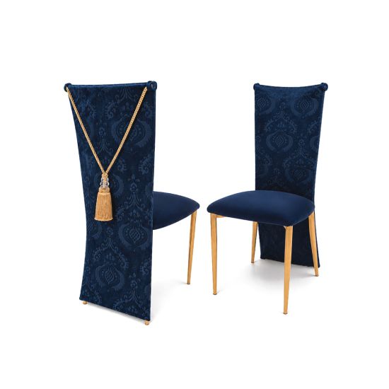 Luxury navy blue dining chair with a damask upholstered back, velvet seat, gold metal legs, and decorative tassel, shown from front and back views.