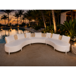 Laguna Crescent curved sofa with ivory upholstery, rope-woven backrest, white frame, and three accent pillows.