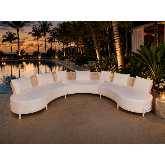 Laguna Crescent curved sofa with ivory upholstery, rope-woven backrest, white frame, and three accent pillows.