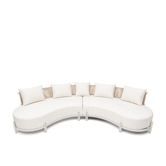 Laguna Crescent 2-piece curved sofa with ivory upholstery, rope-woven backrests, white frame, and five accent pillows.
