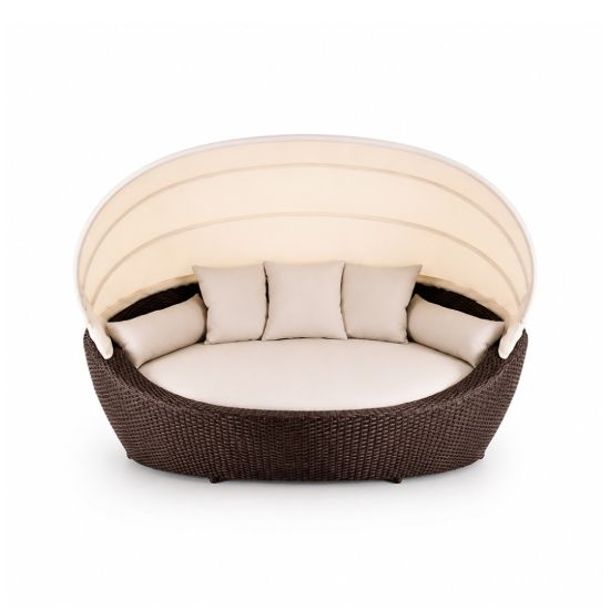 Mocha rattan canopy daybed with round woven base and white cushions, luxury outdoor lounge bed rental for weddings and events.