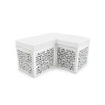 L-shaped Maze bench with white cushioned top and white geometric base, modern modular lounge seating for weddings and events.