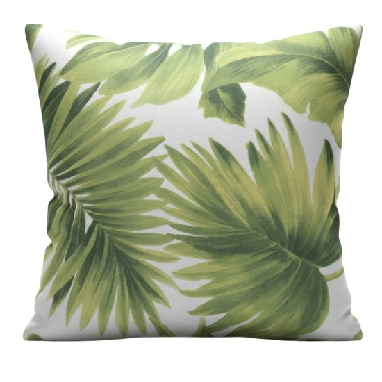 Tropical leaf print throw pillow with large green palm fronds on light background, coastal accent cushion for summer events and lounge décor styling.