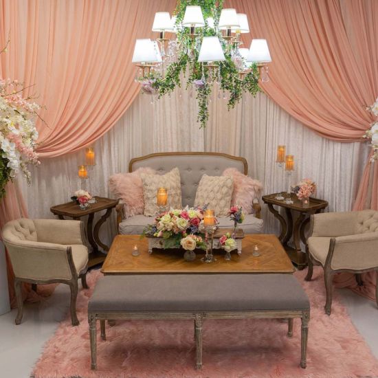 Oak-finish Paris settee loveseat with tufted back and light upholstery, elegant vintage lounge seating for weddings and events