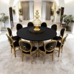 “72″ round Bohemian dining table with black wood top and matching gold base, ideal for modern event dining and reception décor.