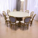 72" Bohemian round dining table with white top and Gold base, ideal for decorating bohemian-style dining rooms and reception areas.