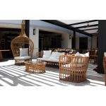 Oval rattan coffee table with open-weave frame and smooth top, offering a relaxed coastal and bohemian aesthetic for lounge settings