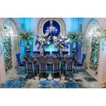 Silver metal Celine banquet chair with Royal Blue upholstered seat cushion for luxury event seating