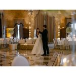 Gold oval-back event chair with polished metal frame and White upholstered seat, modern luxury seating ideal for weddings and upscale receptions.