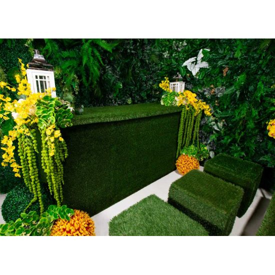 Green artificial-grass panel front event bar rental unit with light top “Grass Collection” garden-style bar configuration.