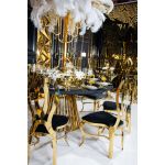 Gold metal event chair with heart-shaped double-oval backrest and White upholstered seat cushion