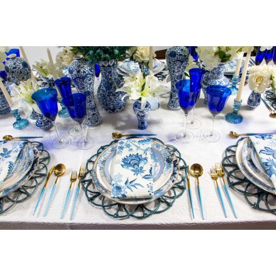 Saint Louis cobalt blue champagne goblet with clear stem and base, elegant colored event glassware for weddings and toasts.
