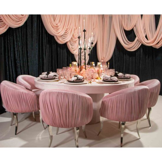 reflection armchair with curved backrest, pleated side detailing, and sleek silver mirrored legs, designed for luxury lounge and event seating.