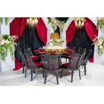 White empire-style arch frame with pointed top, decorative trim, and column bases, statement ceremony arch for weddings and event backdrops.