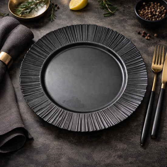 Black textured charger plate with decorative ridged rim