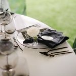 Matte black dinner knife with slim modern handle, sleek disposable flatware set of 10 for formal dinners, receptions, and modern tablescapes.