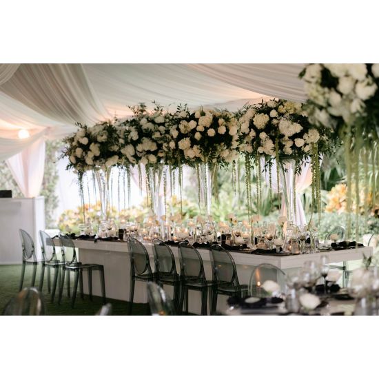 Reflection black 48x96 rectangular dining table with solid black top and pedestal base, modern statement table for luxury event and wedding rentals.