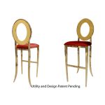 Gold Oz bar stool with Red cushioned seat, round open backrest and gold metal foot-rail base for upscale event bar seating