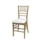Gold resin Chiavari chair with White cushion seat, spindled high back and slim four-leg frame, elegant event seating