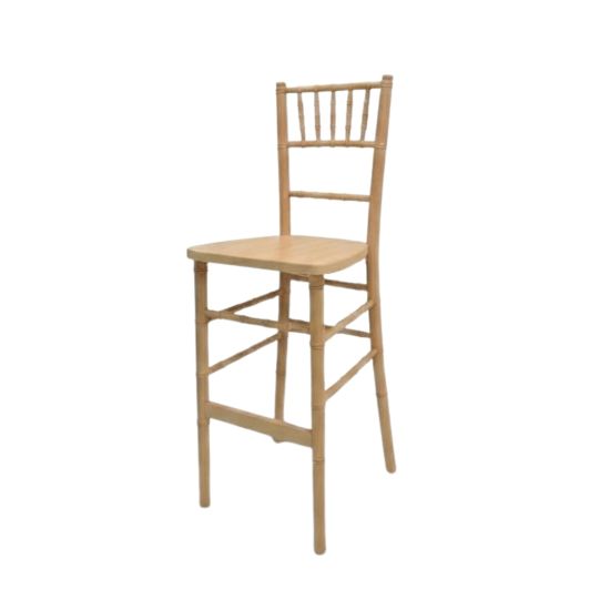 Natural wood Chiavari bar stool with slender spindled back and pedestal-style four-leg frame with foot-rail, event-height seating with rustic elegance