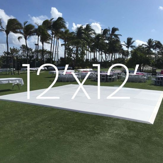White outdoor dance floor on grass with 12x12 size overlay text, modular 4x4 panel dance floor for parties and events up to 50 guests.