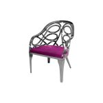 Silver reflective Butterfly Reflection armchair with circular cutout backrest and magenta cushioned seat, modern event lounge chair rental