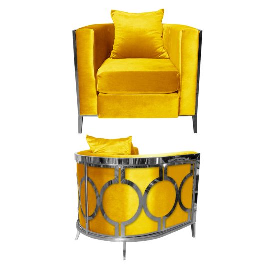 Yellow velvet art deco accent chair with silver frame and curved mirrored back featuring silver circular geometric pattern, luxury lounge seating.