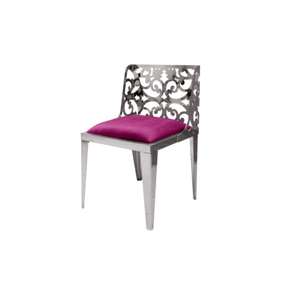 Silver reflection chair with ornate laser-cut scroll backrest and magenta cushioned seat, sleek modern design for upscale event dining and seating.