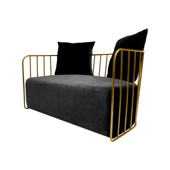 Black velvet accent loveseat with gold metal bar frame and two black pillows, modern art deco lounge seating for luxury events.