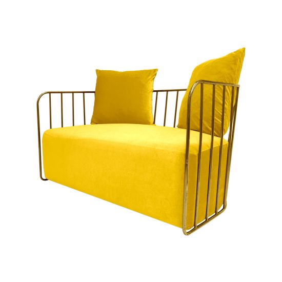 Yellow velvet accent loveseat with gold metal bar frame and two black pillows, modern art deco lounge seating for luxury events.