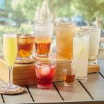 Clear acrylic mojito glass, 12 oz, tall reusable plastic drinkware for cocktails, outdoor events, pool parties, and bar service rentals.