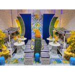 Maze sofa with white frame and lime green cushions and pillows, modern lounge seating for weddings, outdoor events, and VIP lounges.